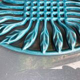 Old flat rest in enamelled cast iron celadon green