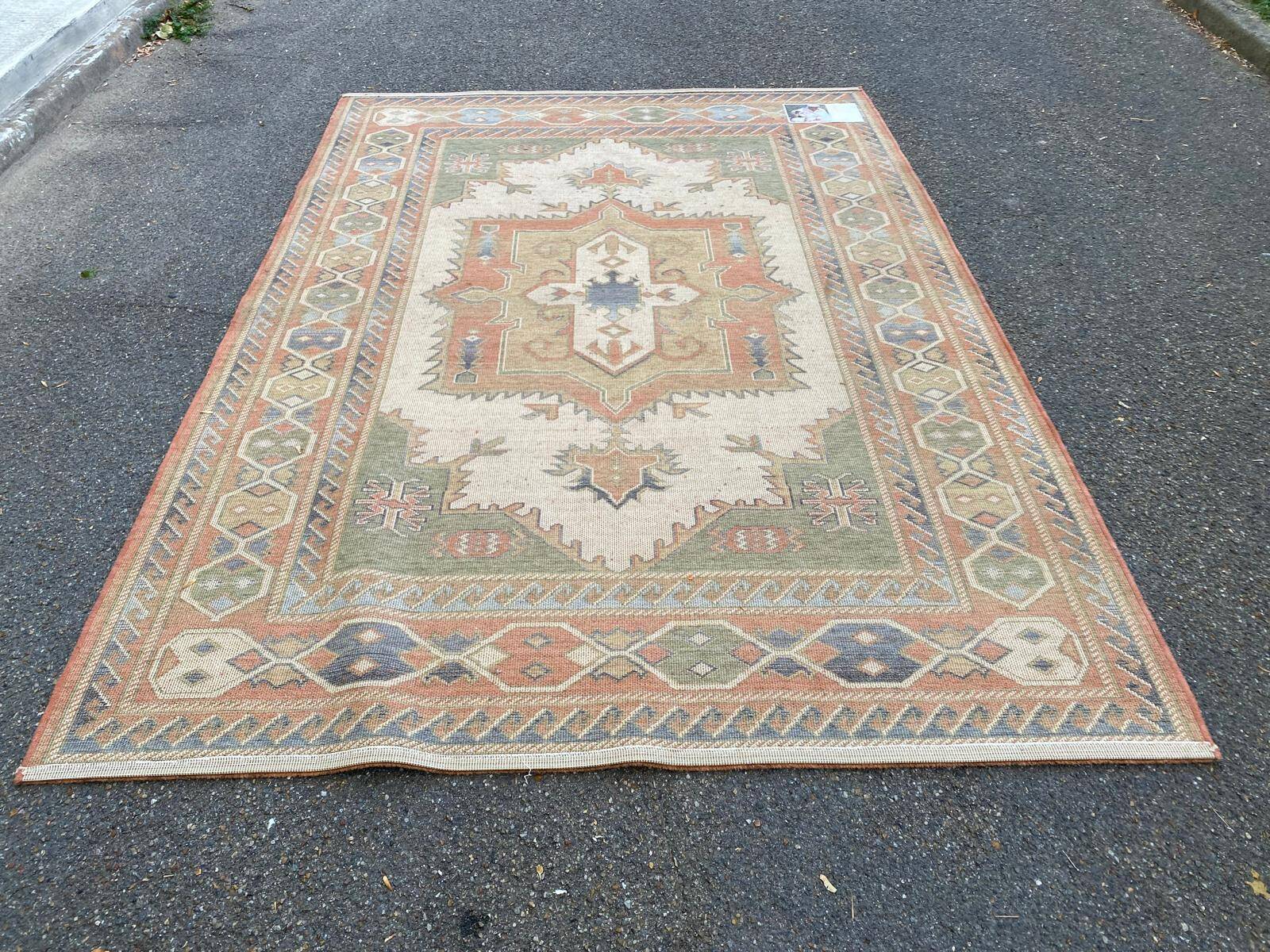 Large oriental wool rug with terracotta geometric patterns 200x300cm