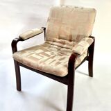 Fauteuil et ottoman tissu Dedar.