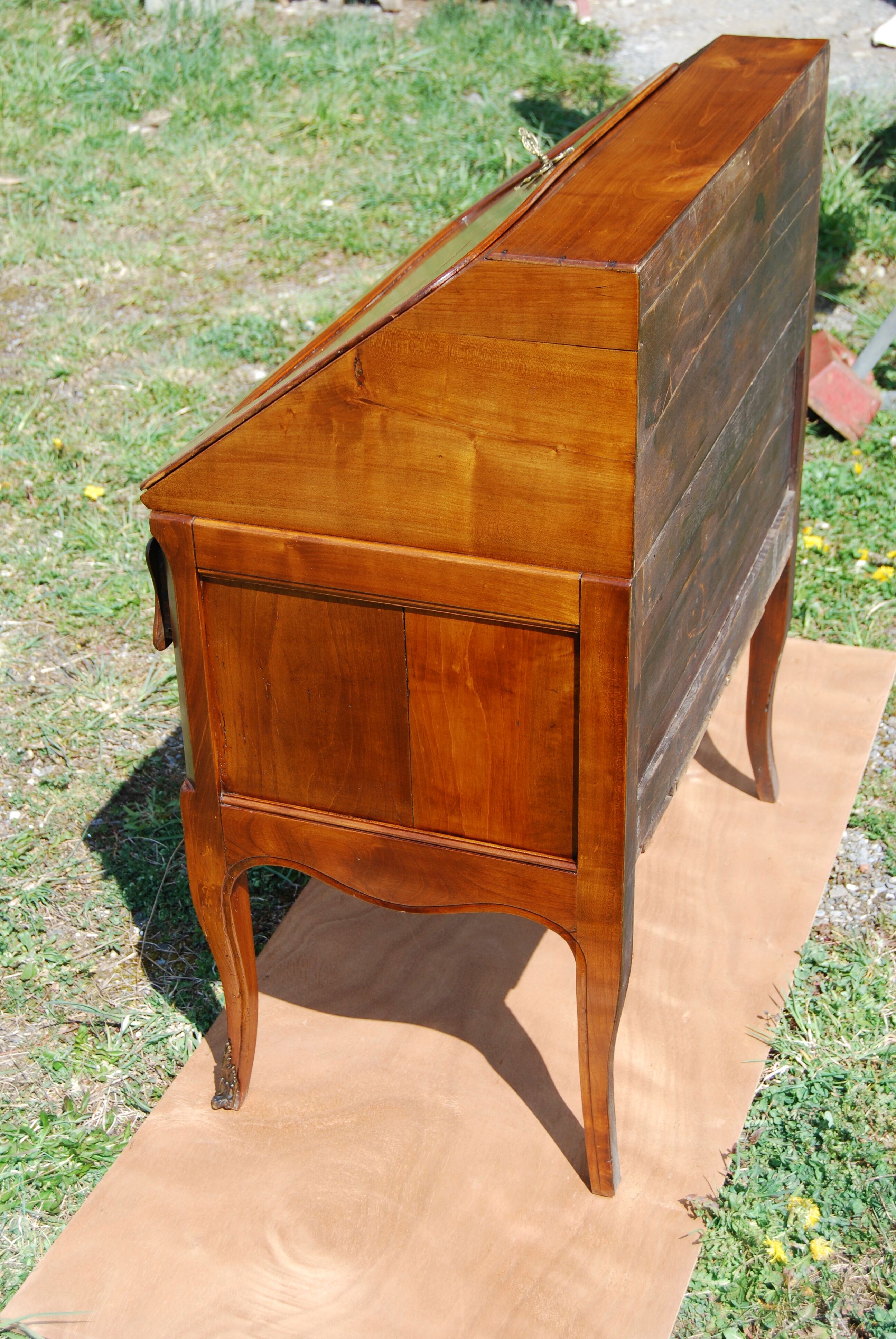 Sloping desk, secretary, donkey back Louis XV walnut.