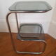 Metal console and smoked glass