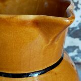 Yellow Provencal ceramic water pitcher with black net