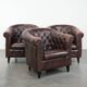 Set of three classic English-style Chesterfield cowhide  club armchairs