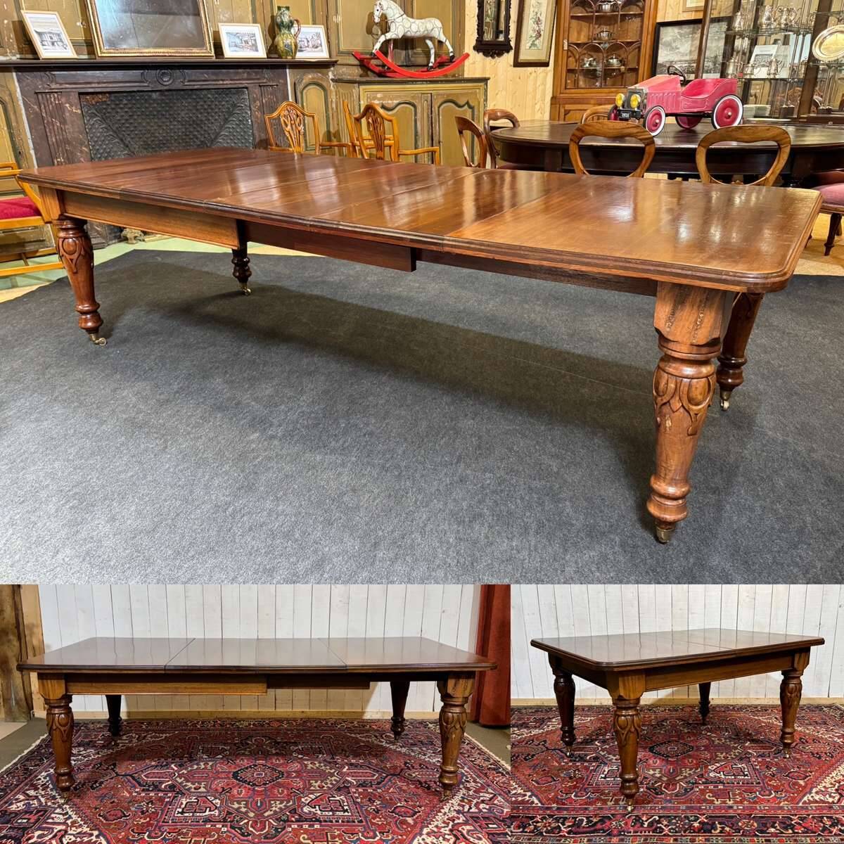 Victorian-style mahogany English table with 3 extensions.