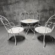 Salon de jardin ancien en fer forgé, début du XXe siècle