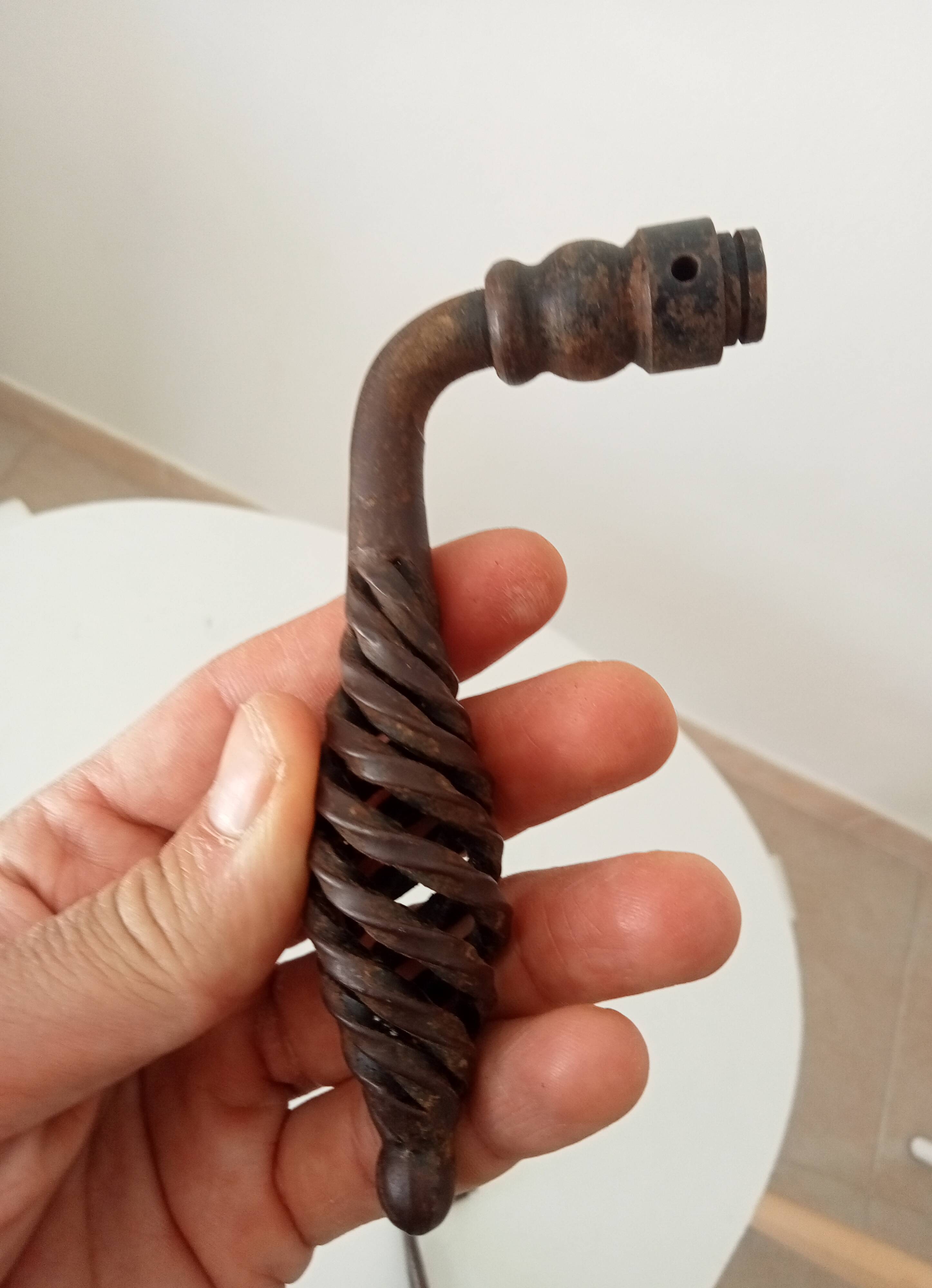 Twisted door handle in solid wrought iron, antique.