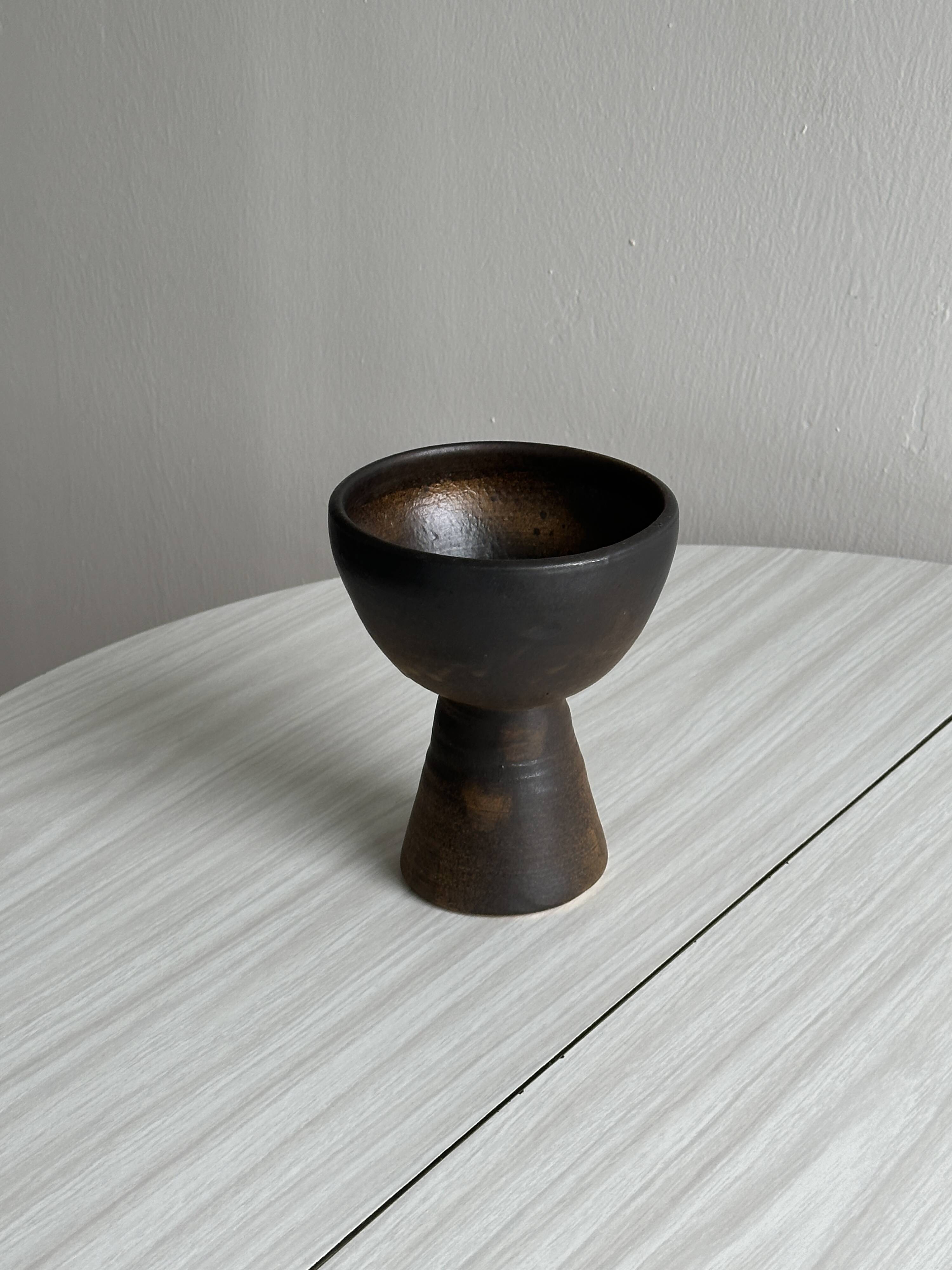 Dark brown raw ceramic cup