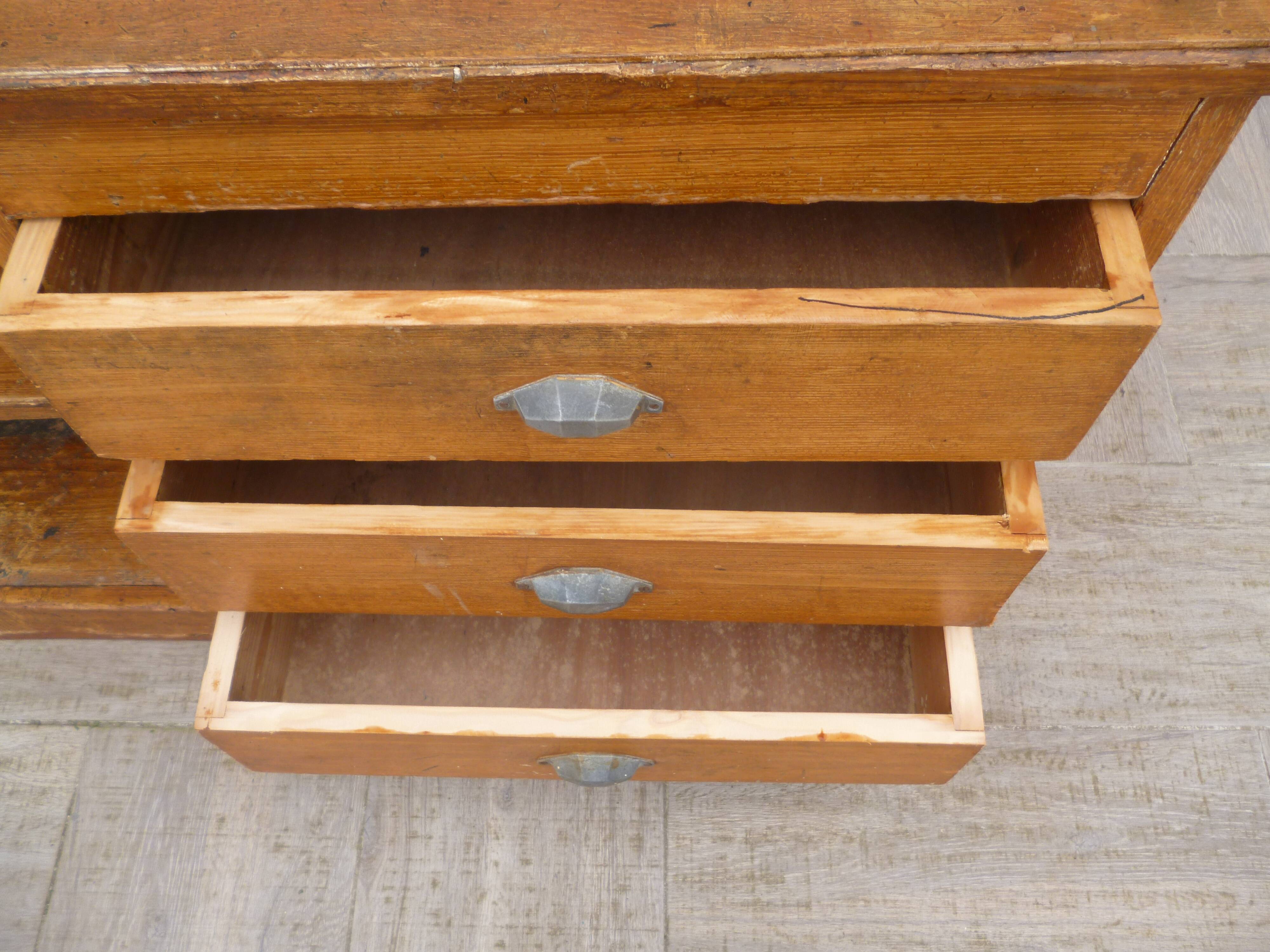 Trompe l'oeil painted store counter pitchpin style