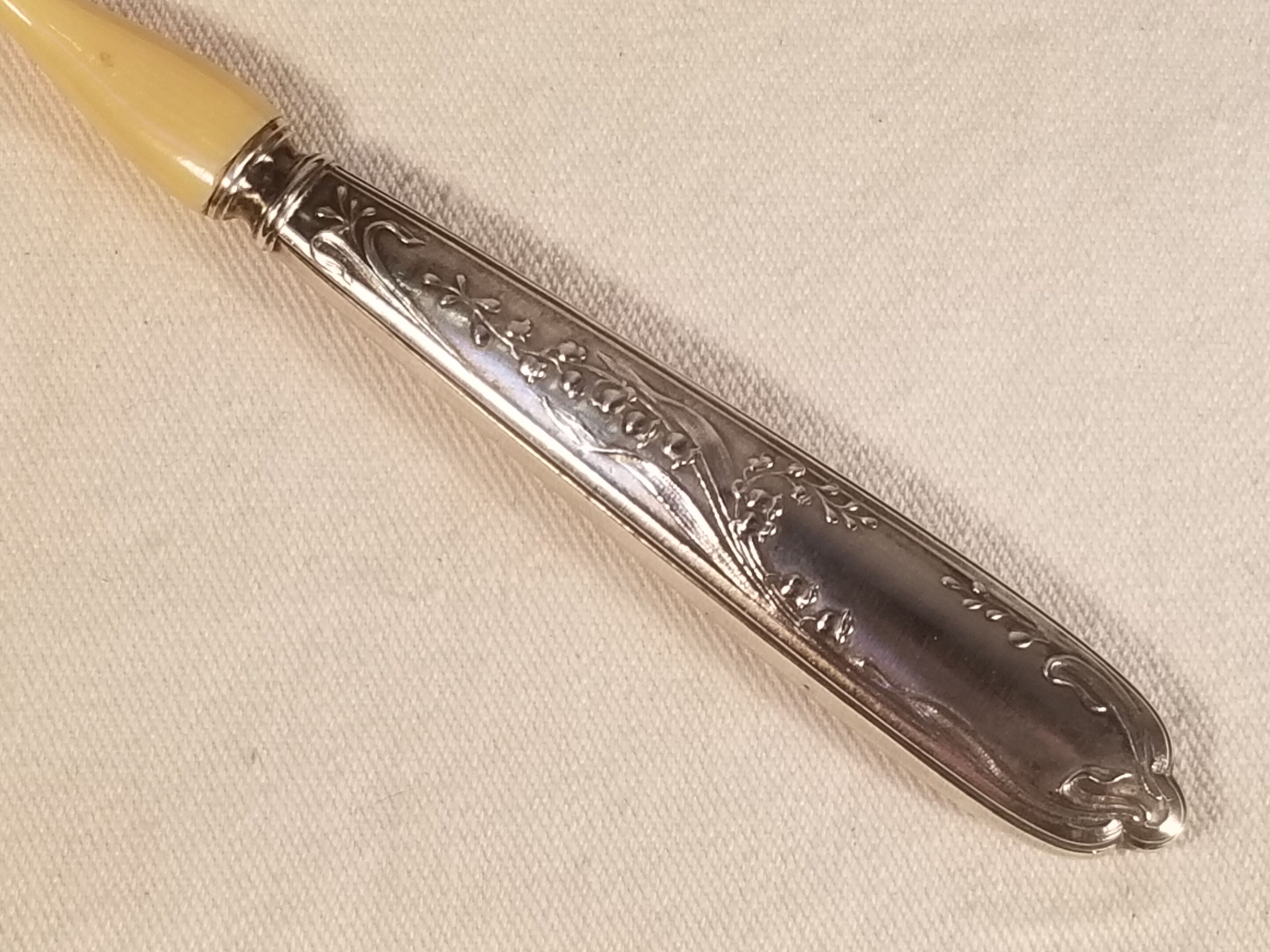 Old ivory silver porridge spoon