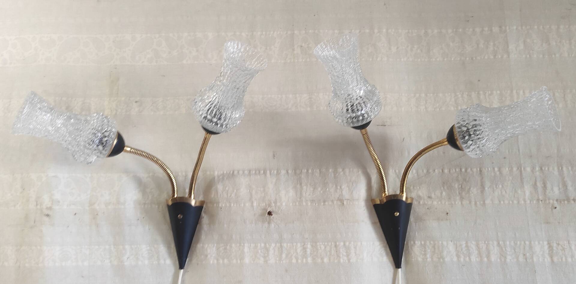 Articulated double light wall sconces in brass and glass - mid 20th century.