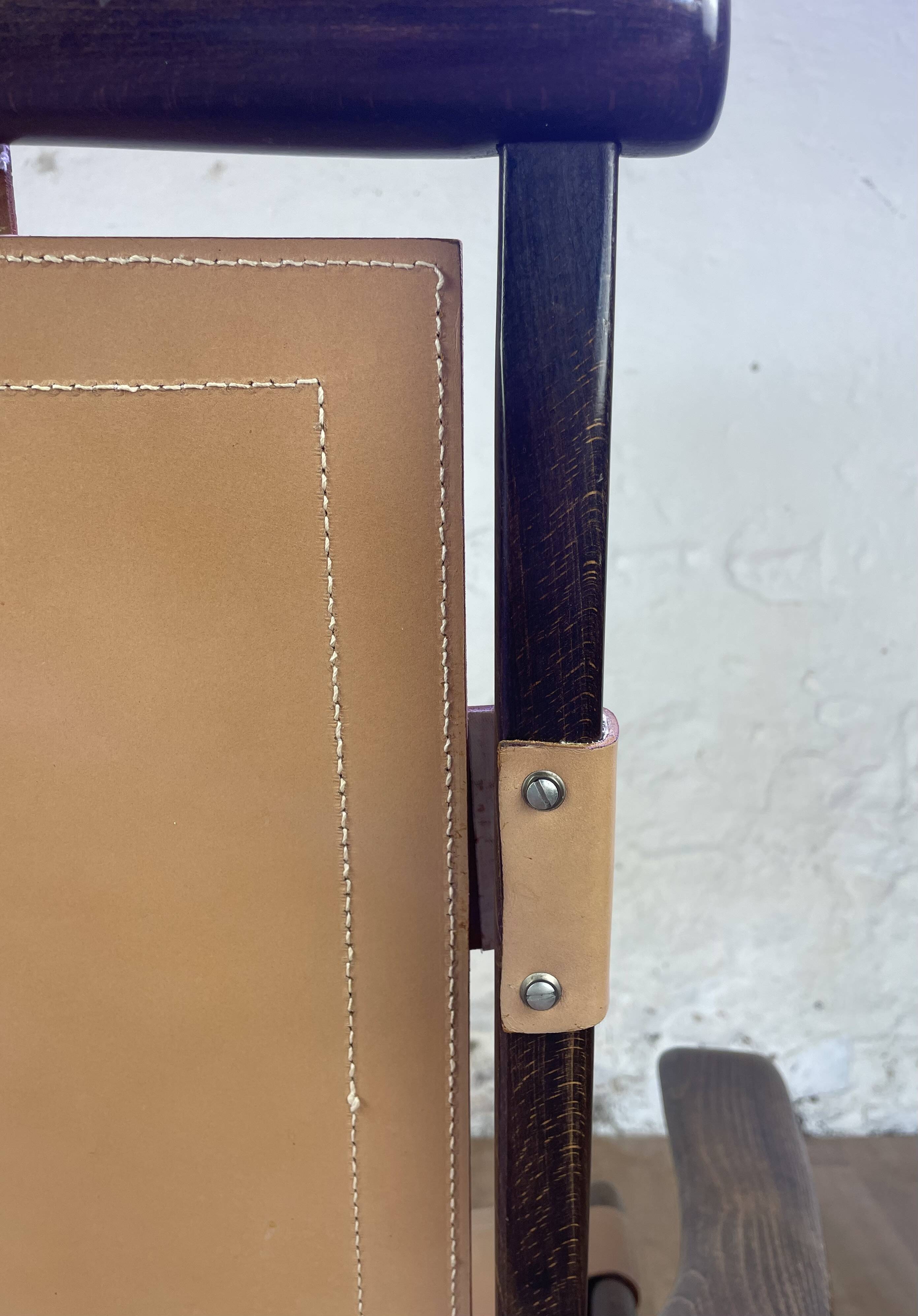 Colonial style leather armchair and ottoman