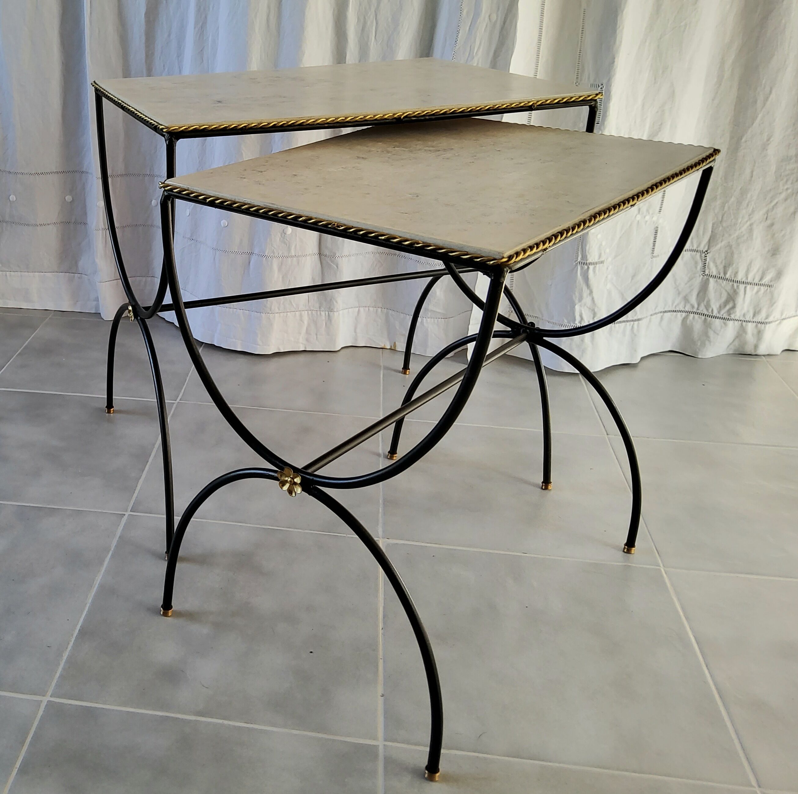 Pair of curule nesting tables