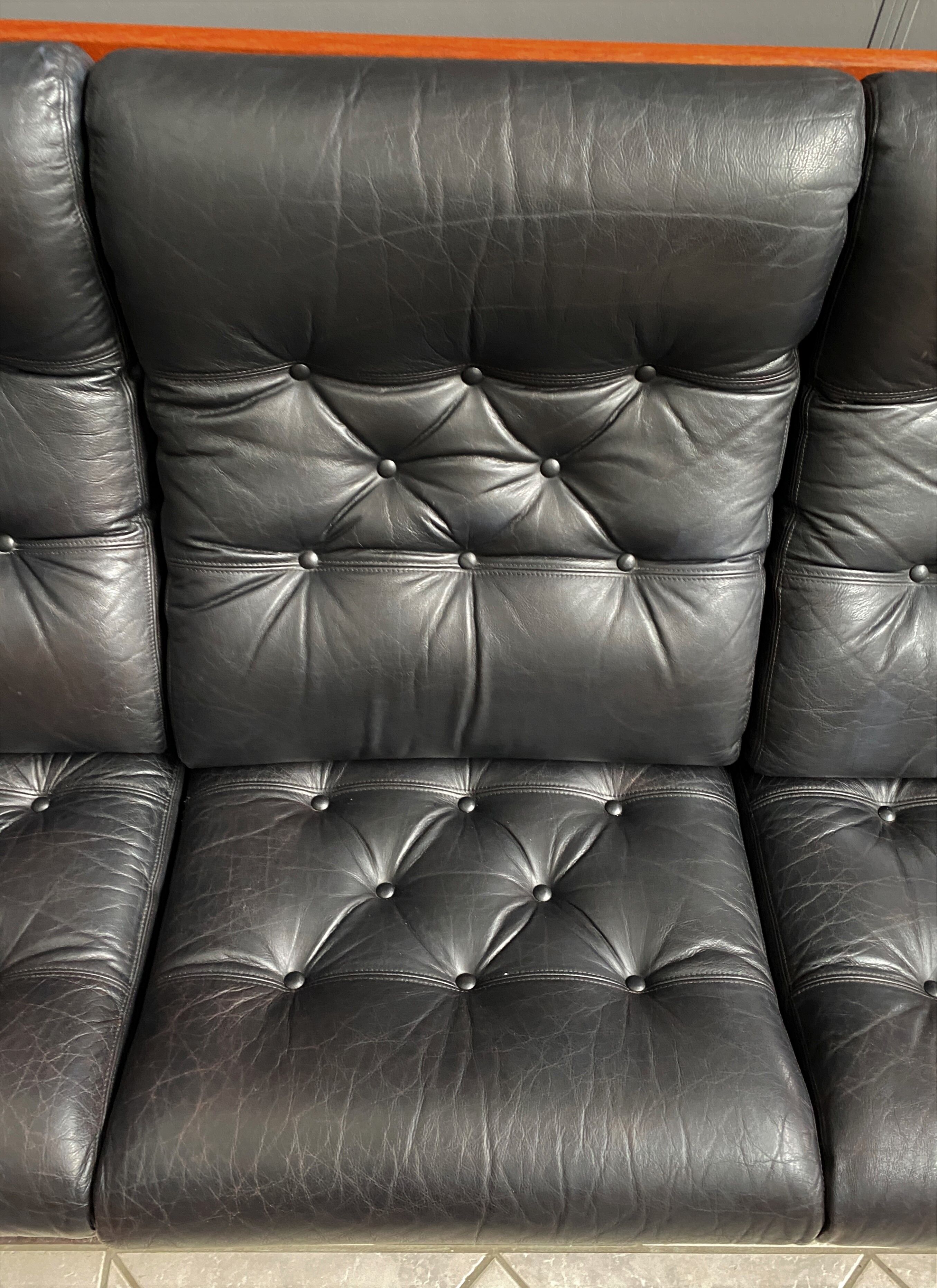 Teak and Black Leather 32 seat sofa by HS Denmark 1970s