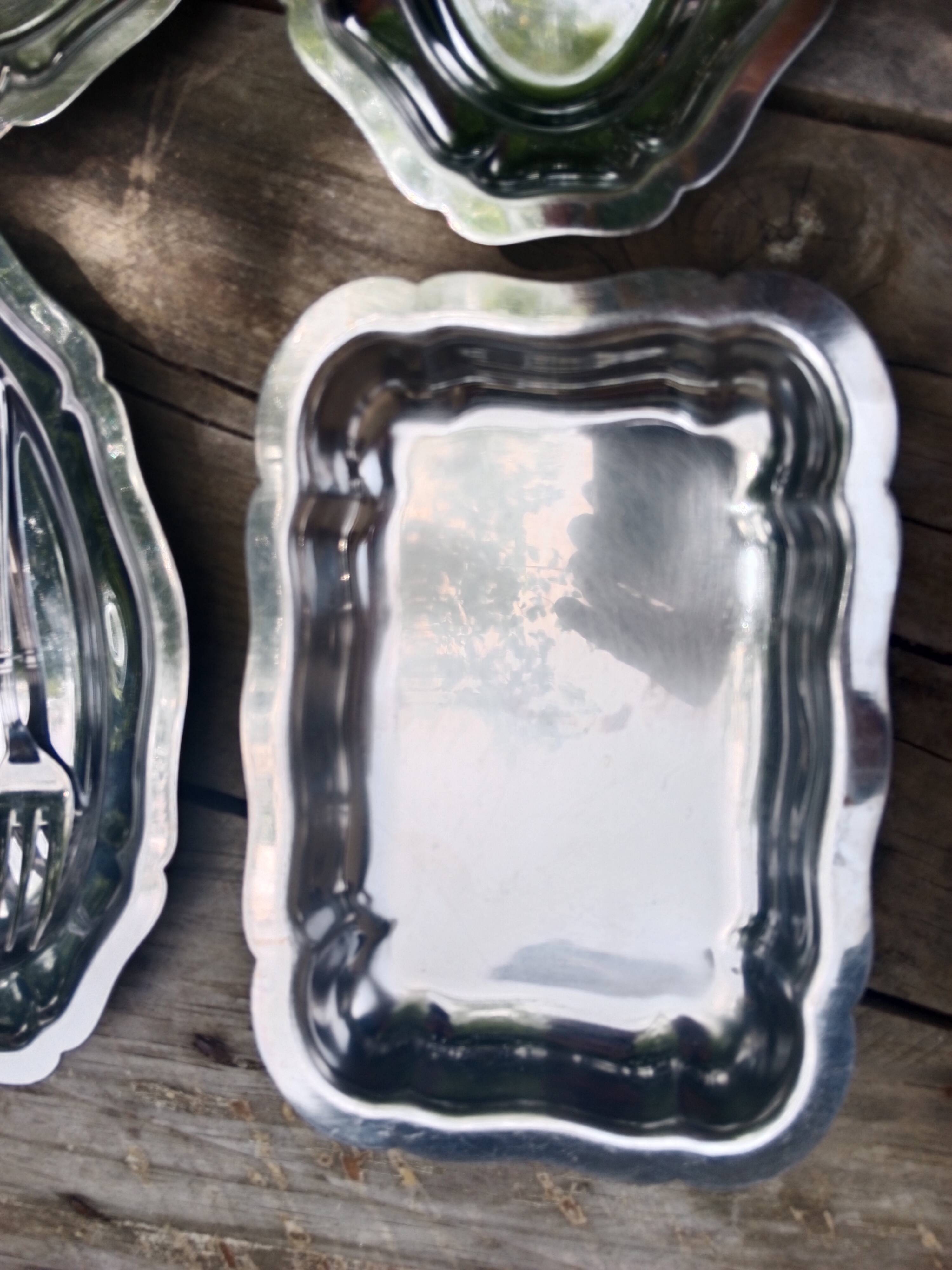 Small vintage platters and presentation forks