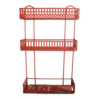 Vintage shelf in red openwork metal