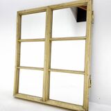 Vintage wooden window converted to a mirror