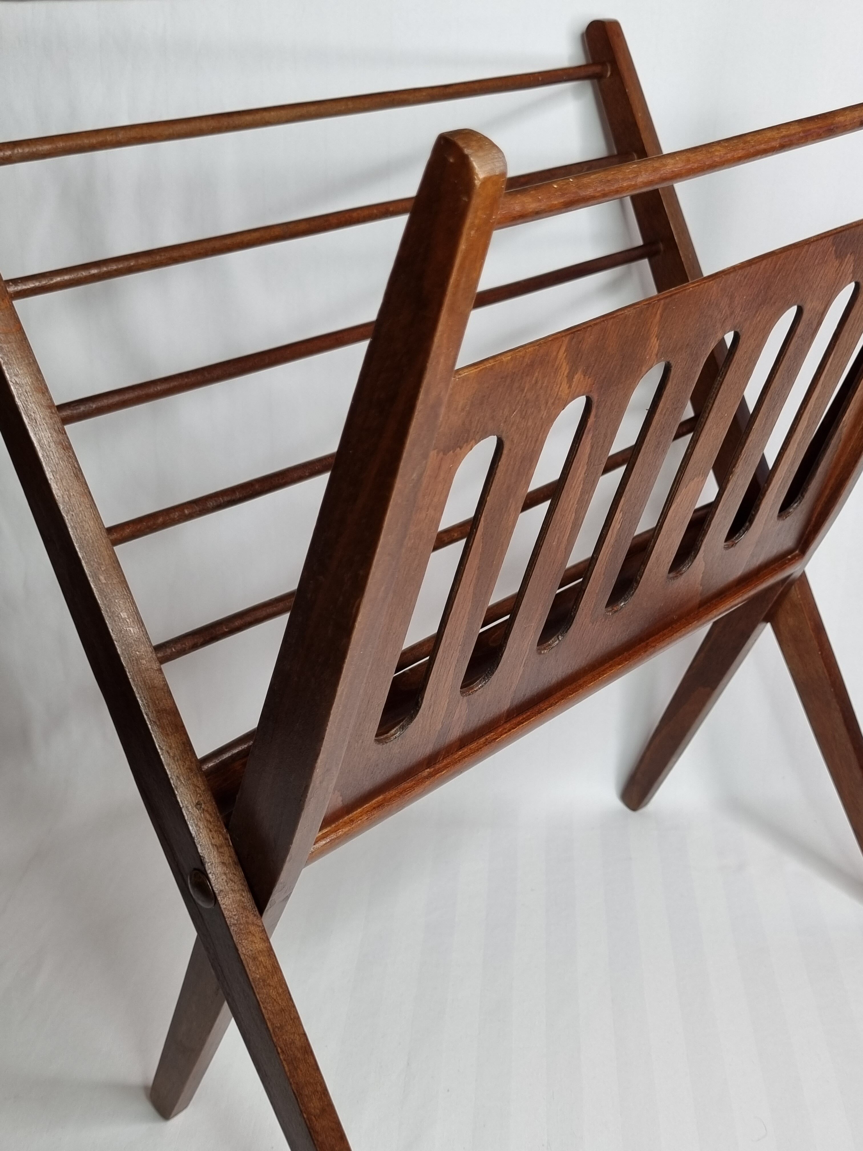 Folding teak magazine door by Cees Braakman