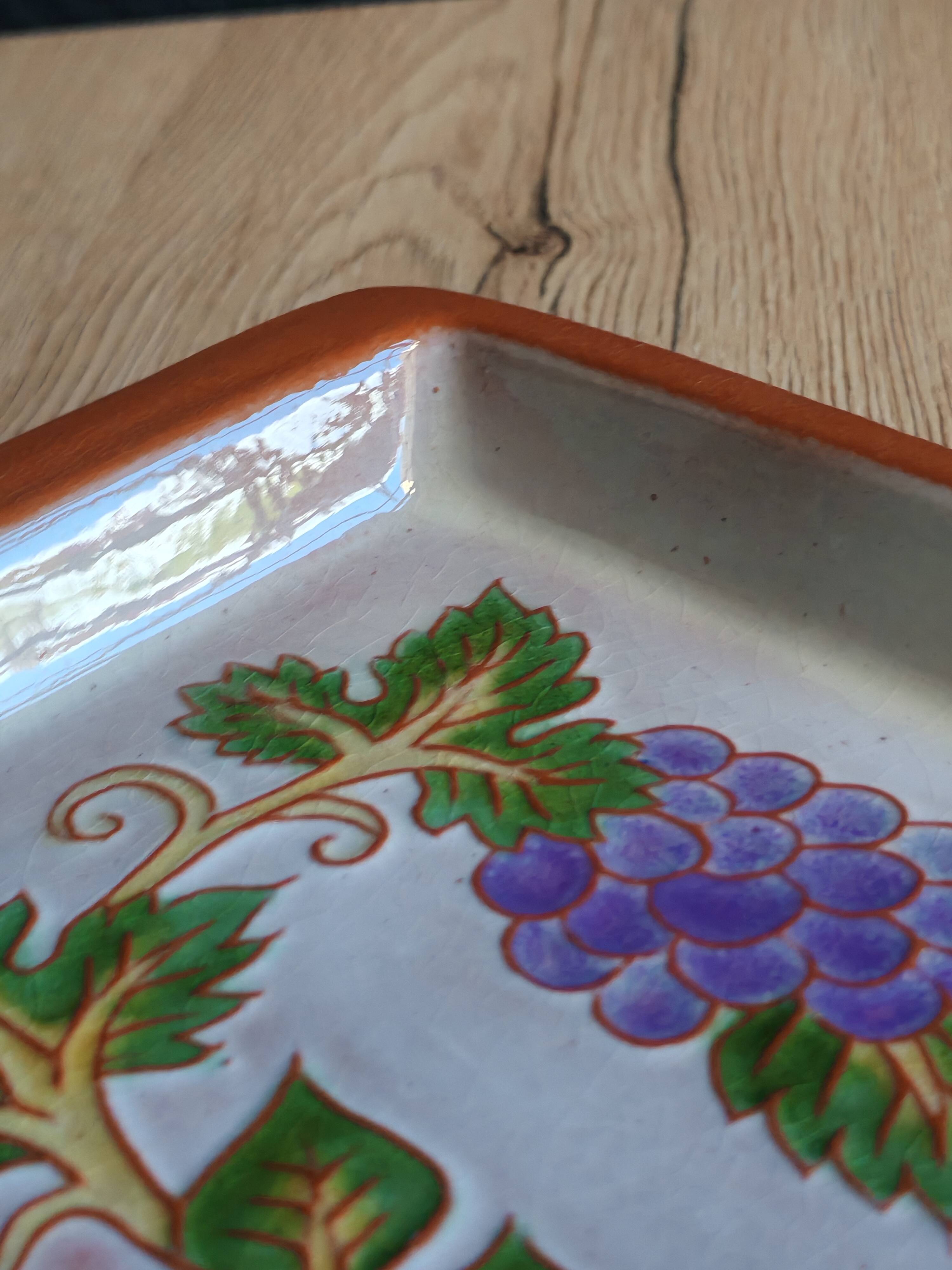 Terracotta plate signed P.Boy, glazed artisanal ceramics.