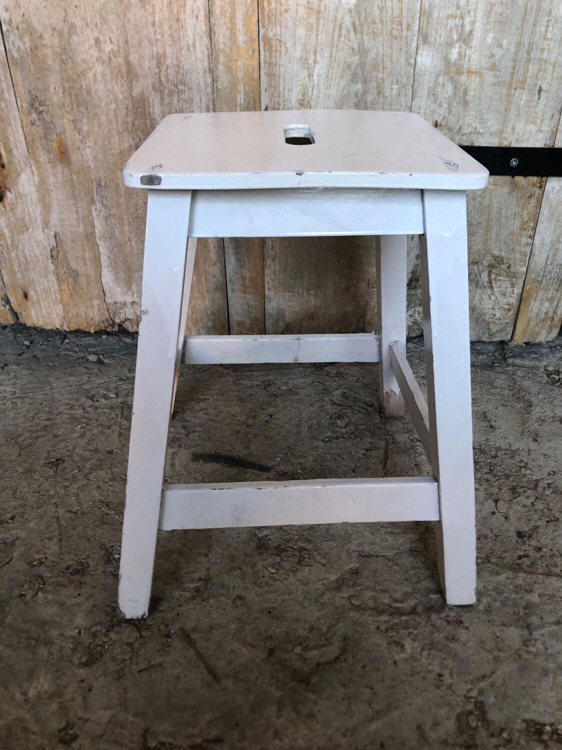 Vintage white wood milking stool