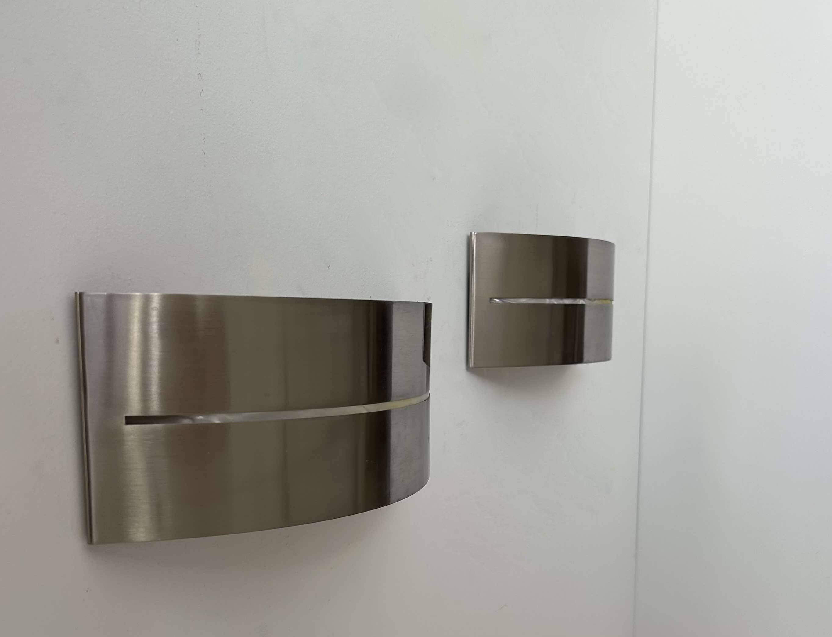 Pair of vintage wall lights, brushed metal, France 1980.