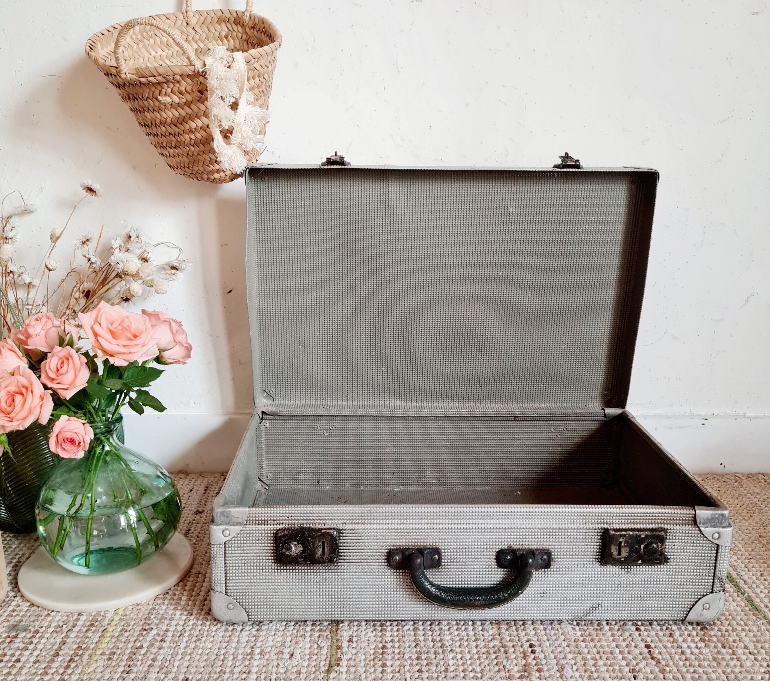 Old metal suitcase green leather handle