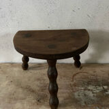 Wooden tripod farm stool