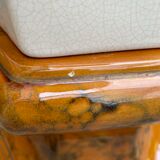 Column wears vintage plant