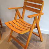 Pair of folding armchairs in varnished wood signed Clairitex