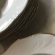 Hollow porcelain plates of pure white and gold