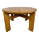 Extendable round table Maison Regain in solid elm, 1970s design.