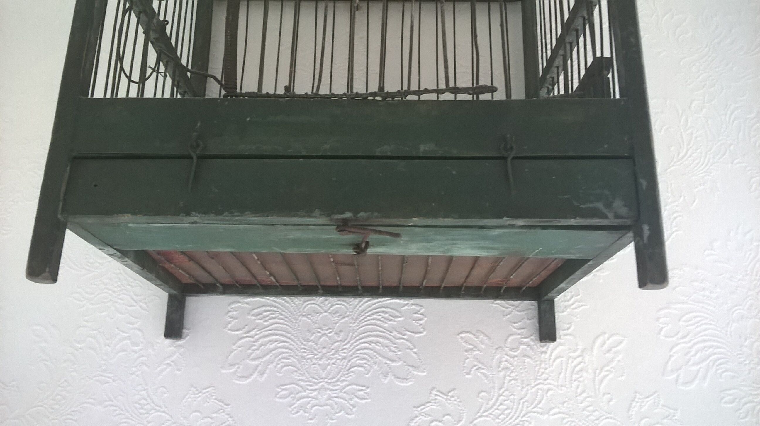 Wooden bird cage with feeder