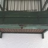 Wooden bird cage with feeder