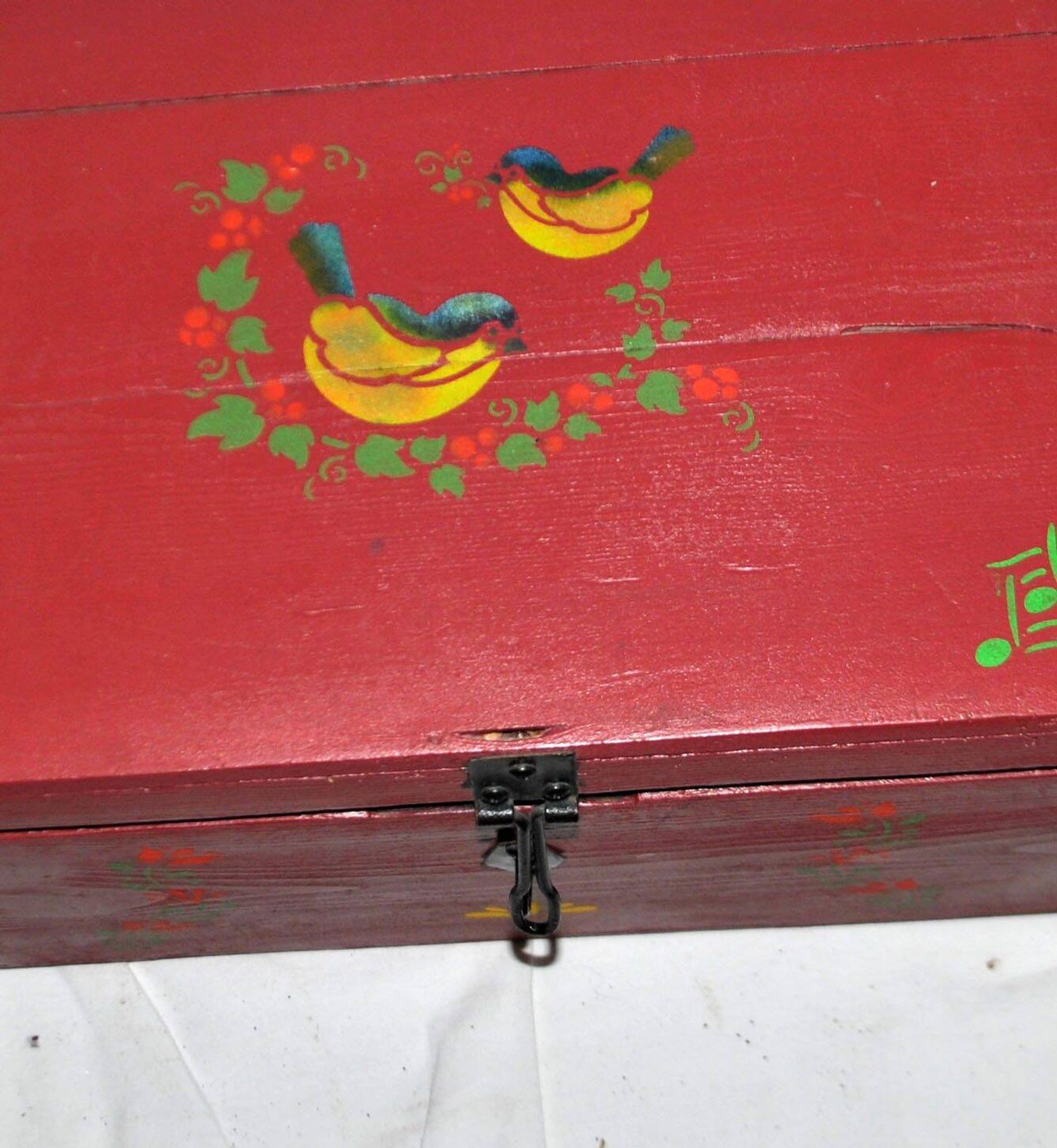 Vintage wooden trunk – toy chest or music box with painted stencil bird decoration.