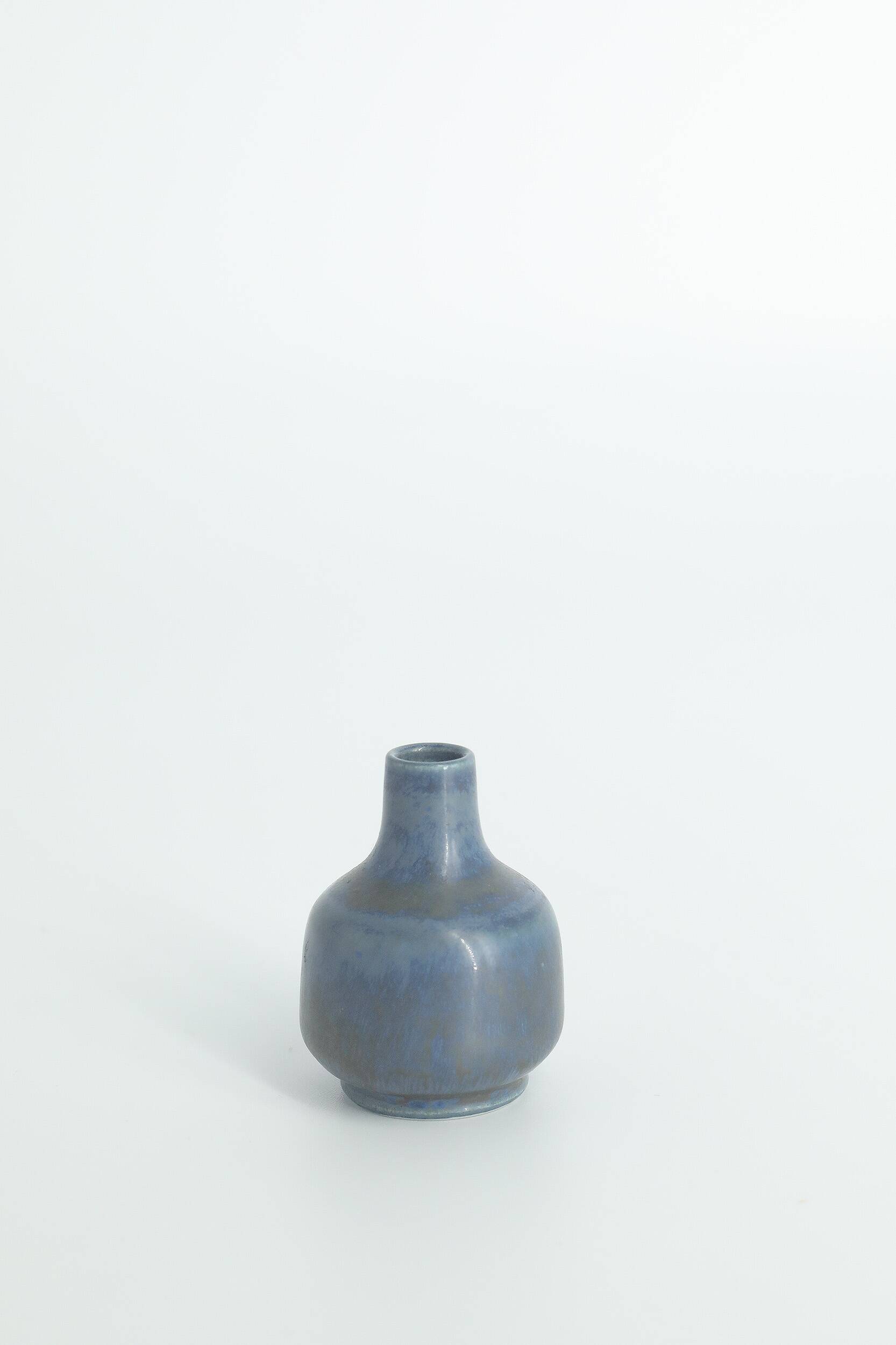 Set of 4 Mid-Century Scandinavian collectible vases in blue and brown stoneware by Gunnar Borg.