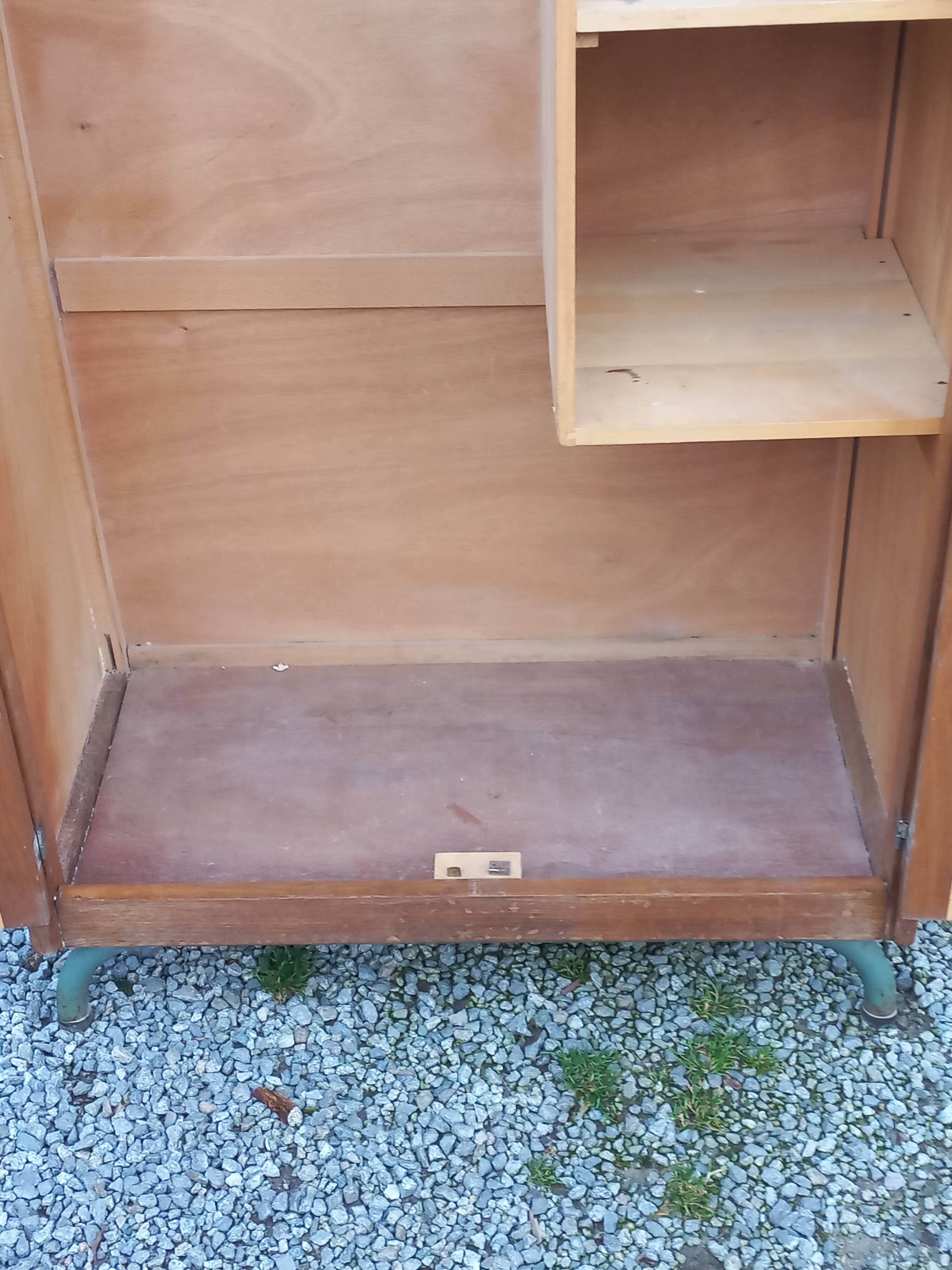Vintage oak wardrobe with metal legs from the 1950s.