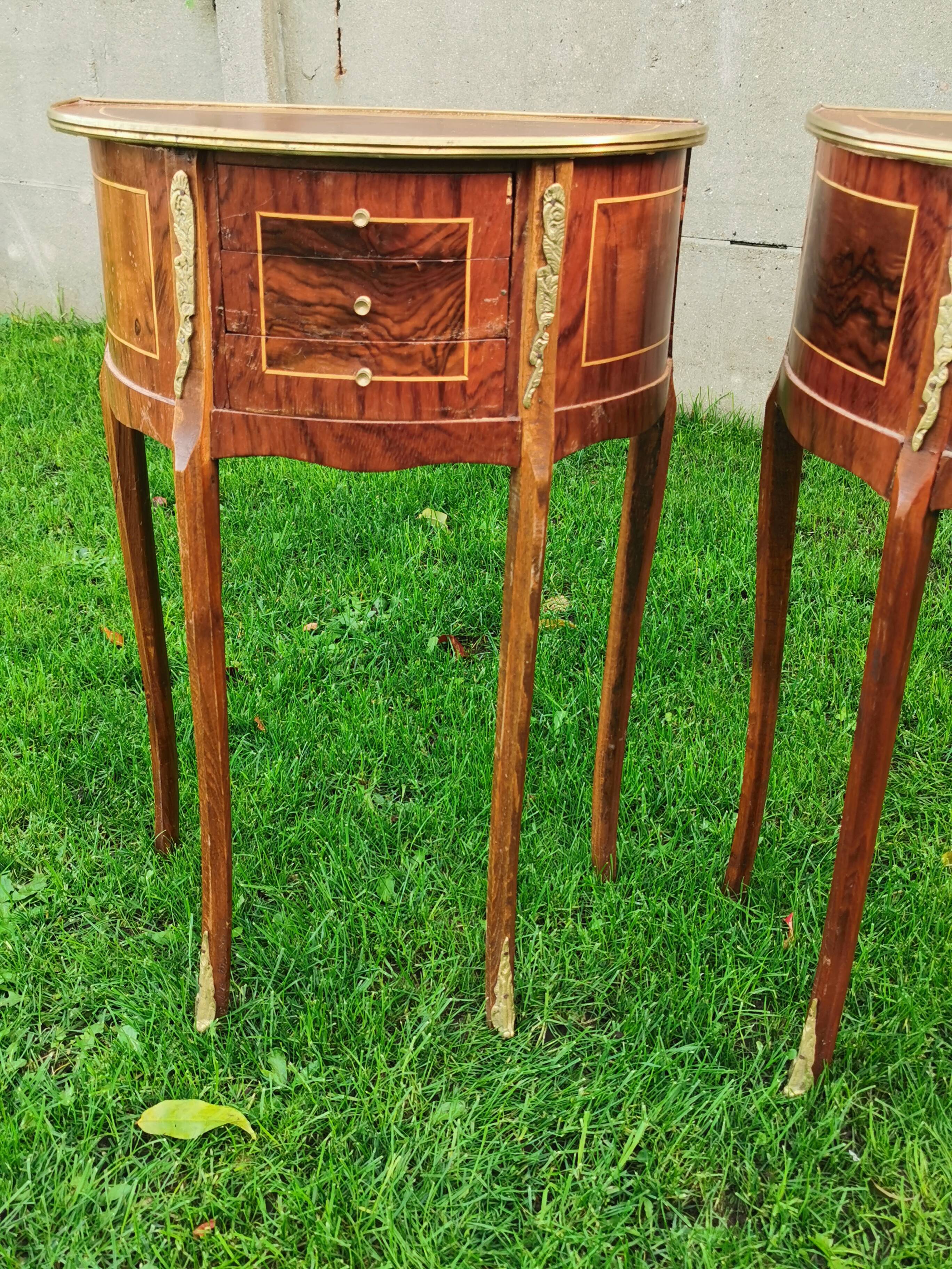 half-moon bedside pair in marquetry, bronze ornaments