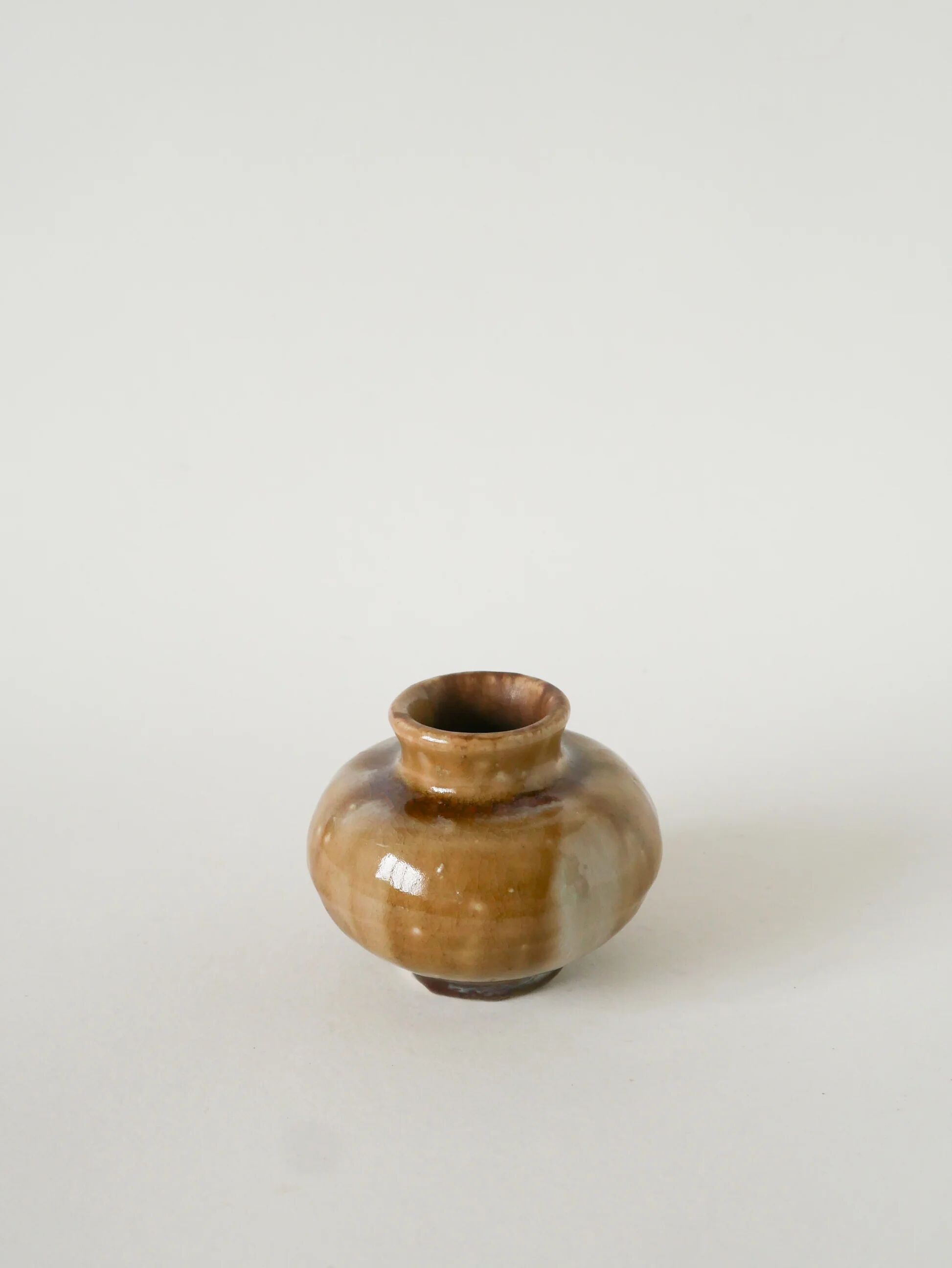 Small ceramic vase, light brown, 1970.