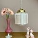 Vintage art deco globe pendant light in pale pink opaline.