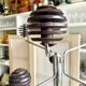 Space Age coat rack with 8 hooks in chrome-plated metal and brown bakelite