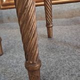 Golden wooden piano stool