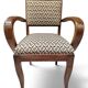 Art Deco armchair with a moustache backrest and curved armrests from the 1930s.
