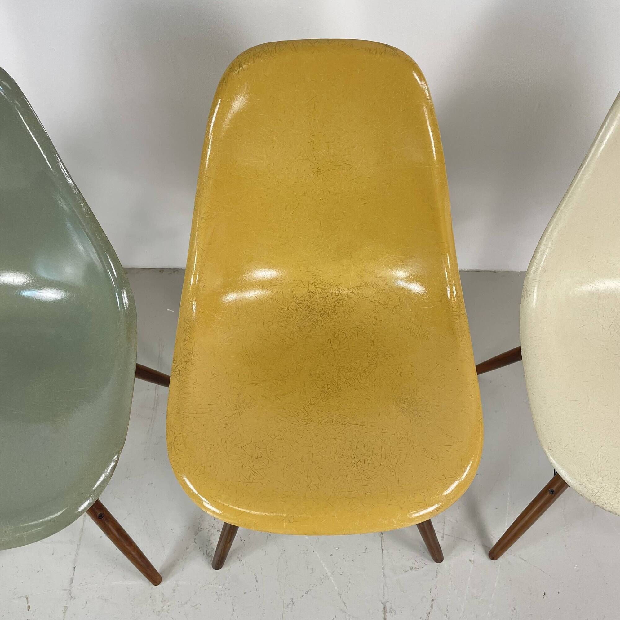 Eames Herman Miller DSW side chairs in greige, seafoam green, light ochre and parchment with slight