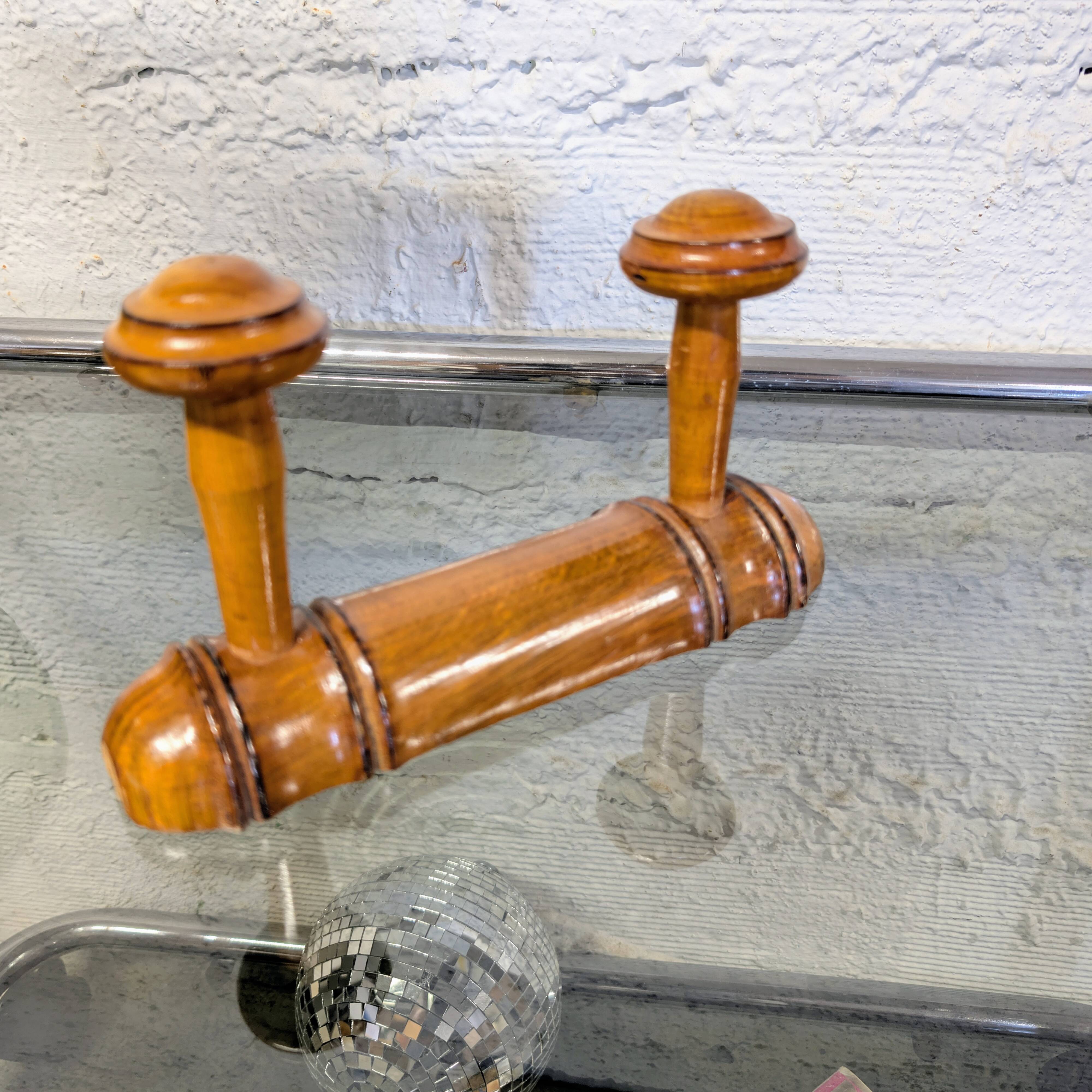 Turned wooden coat rack