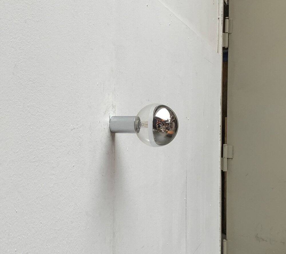 Vintage wall lamp from the German space age by Motoko Ishii for Staff, 1970s.