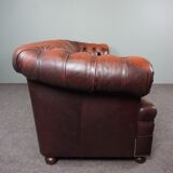 Chesterfield sofa in resistant cowhide, 3 seats