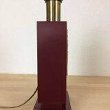 1980s vintage lamp base in red wood and gold metal.