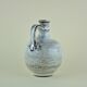 Pitcher with speckled decoration by Roger Collet