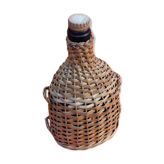 Bottle old woven wicker glass wood and cork cork