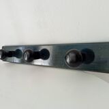 Vintage wall-mounted coat rack in lacquered wood from the 60s