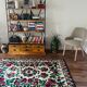 White vintage floral rug made by hand in Romania, beautiful flowers